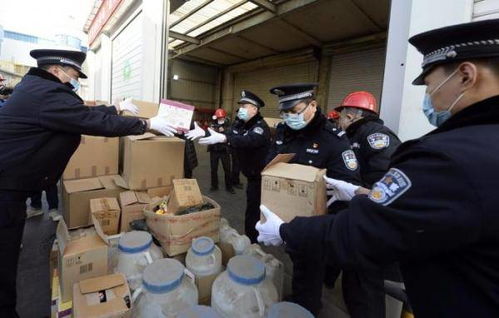 现场 北京警方集中销毁1.9万余瓶假酒 2.2万余盒假药